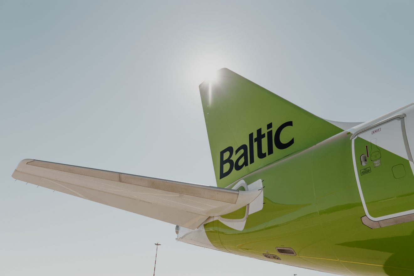 The tail fin of an airBaltic A220-300