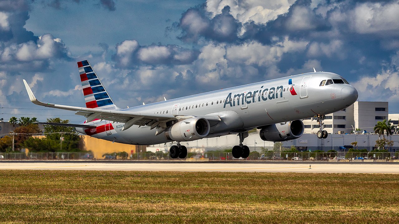 An American Airlines flight takes off.