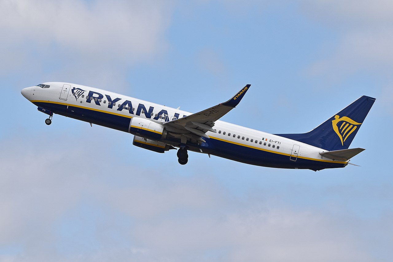 A Ryanair Boeing 737 climbing steeply after takeoff.