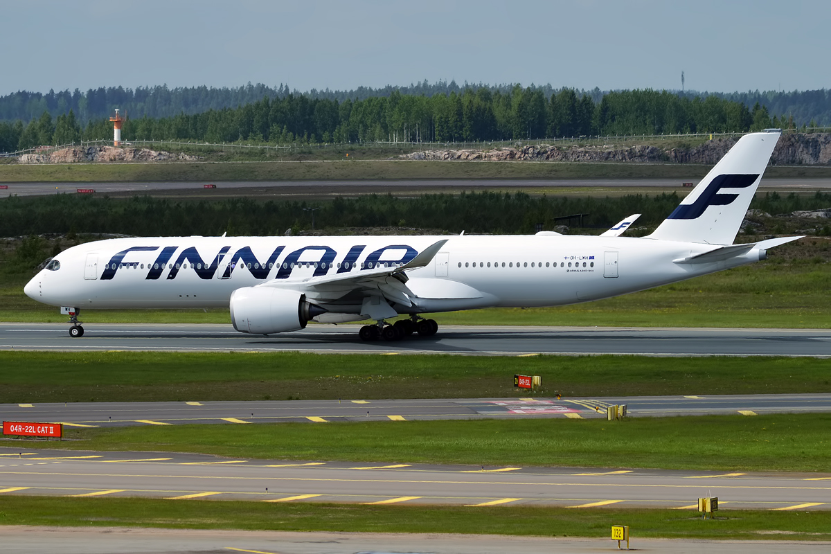 A Finnair Airbus on the runway.