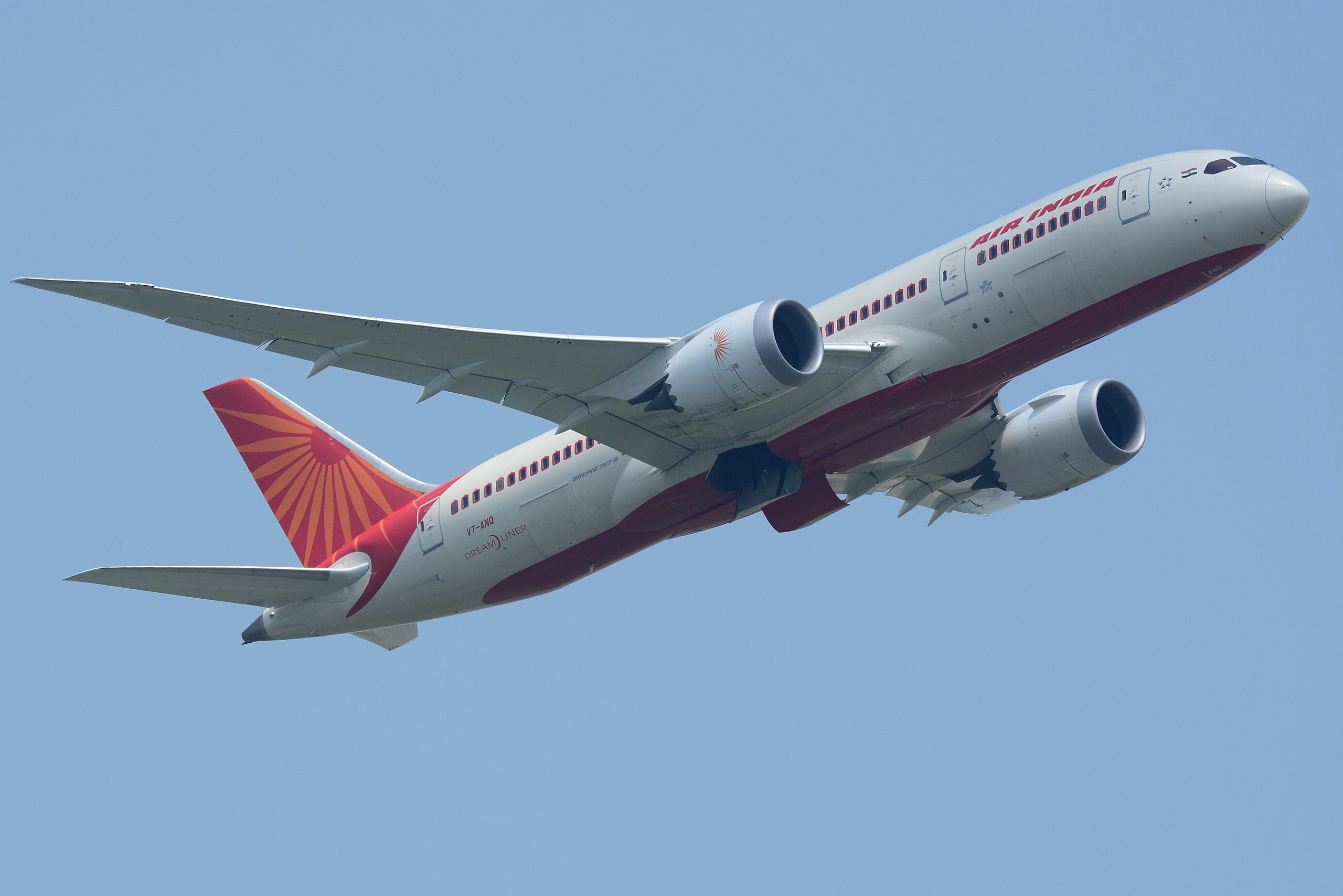An Air India Boeing Dreamliner climbs out after takeoff.
