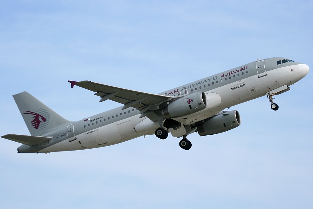 A Qatar Airways A320 climbs after takeoff.