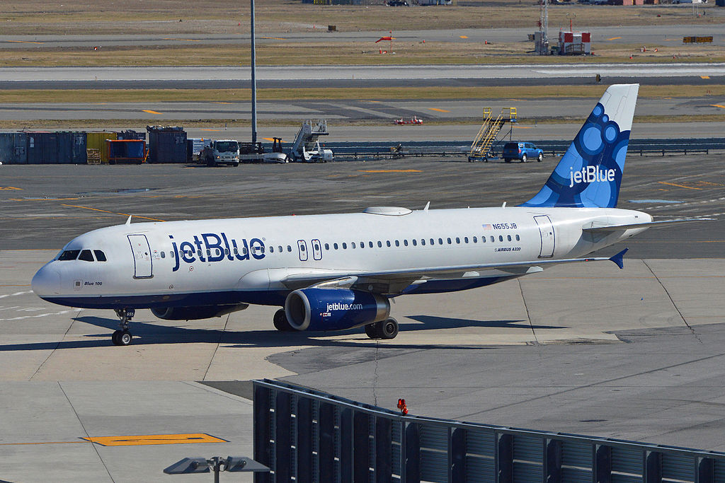 A JetBlue Airbus A320 taxis to the terminal.