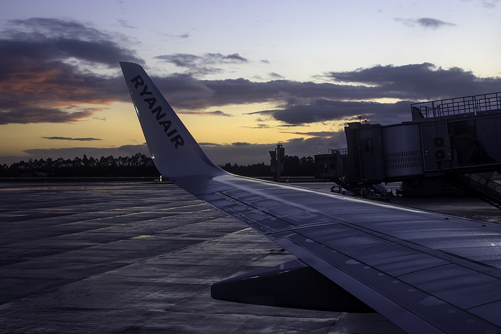 A view across a Ryanair 737 wing at sunset.