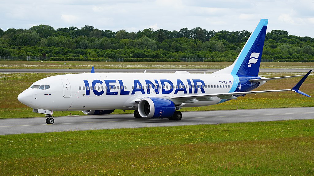 An Icelandair Boeing 737 lines up on the runway.