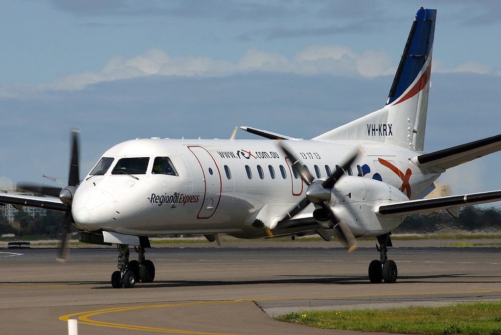 A Rex Airlines SAAB 340 taxis in.