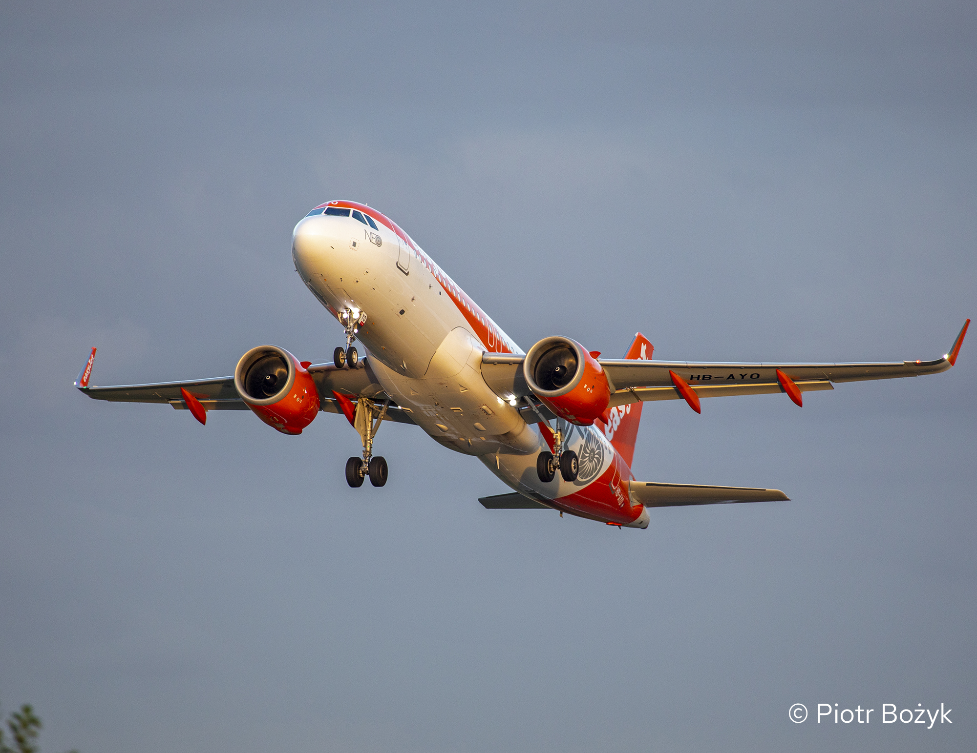 An easyJet Airbus climbing after takeoff.