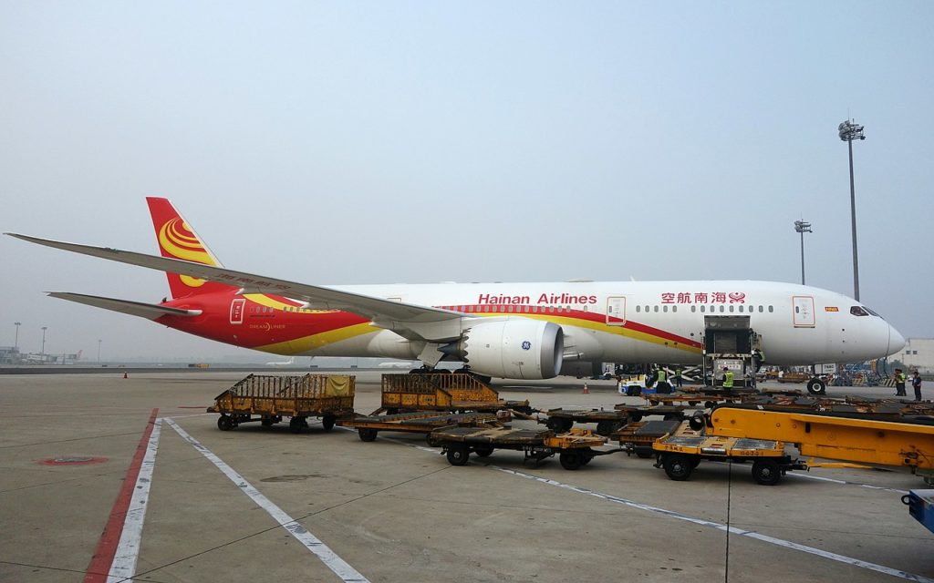 A Hainan Airlines aircraft being loaded with cargo