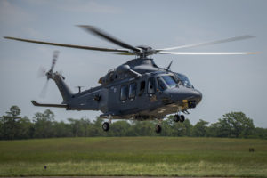 A US Air Force MH-139 Grey Wolf lifts off for a mission.