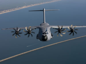 An Airbus A400M over the ocean.