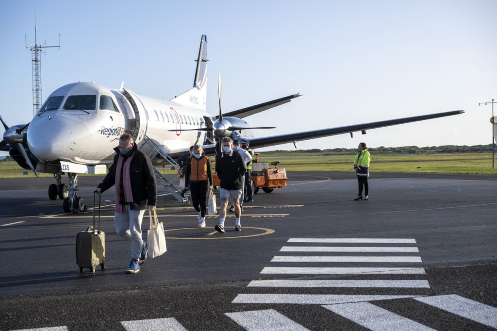Rex Airlines passengers disembarking at Devonport Airport.