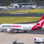 A Qantas Freight B767 aircraft being towed.