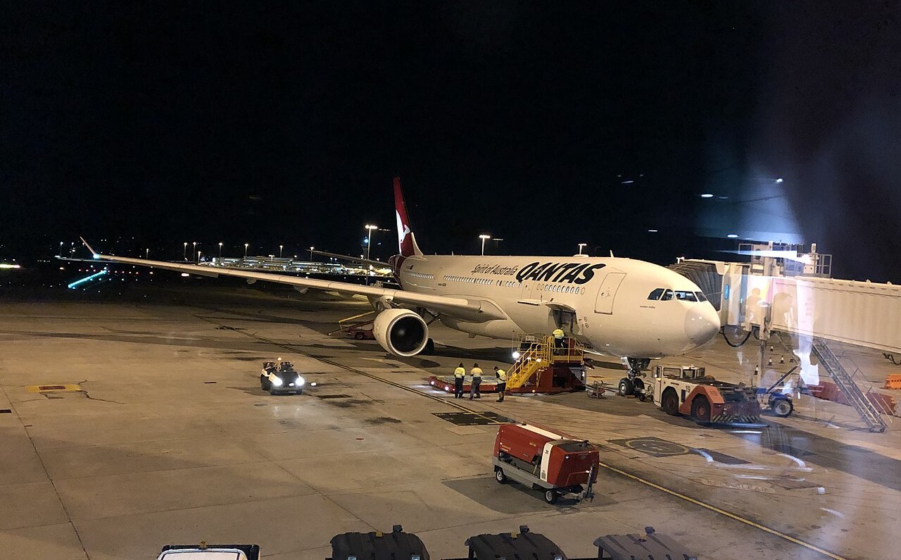 A Qantas Airbus being unloaded.