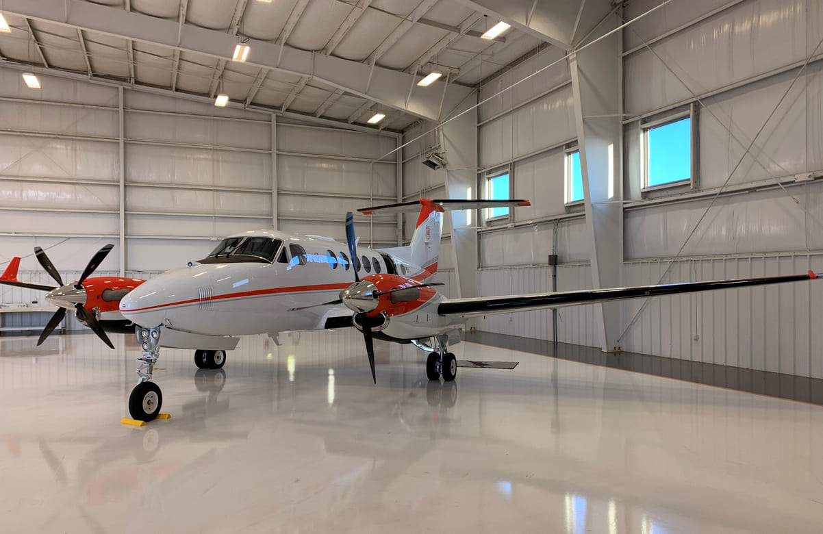 US Forest Service Kingair 260 parked in hangar