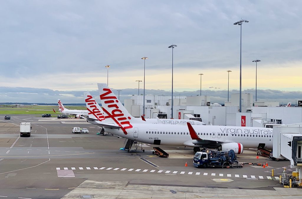 3 Virgin Australia aircraft parked at Sydney Terminal