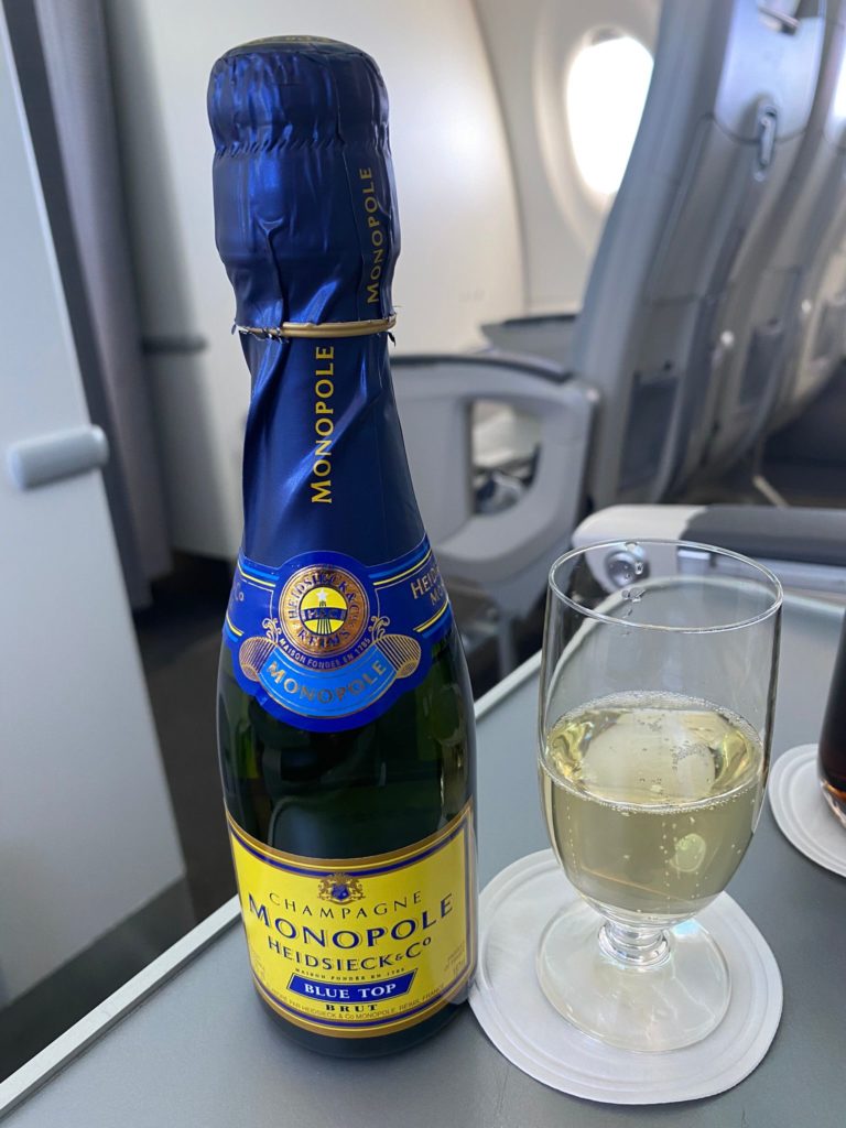 An inflight champagne aboard airbaltics flight from Oslo to Riga