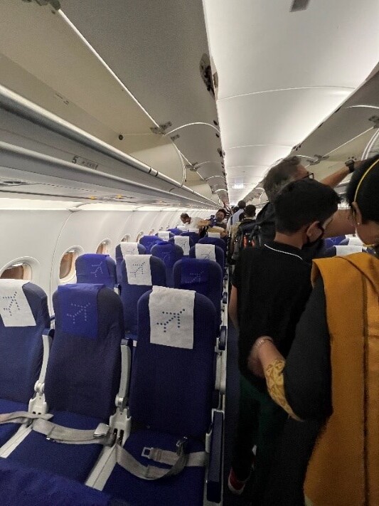 Passengers board an IndiGo flight.