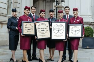 Qatar Airways staff show off their Skytrax 2022 awards