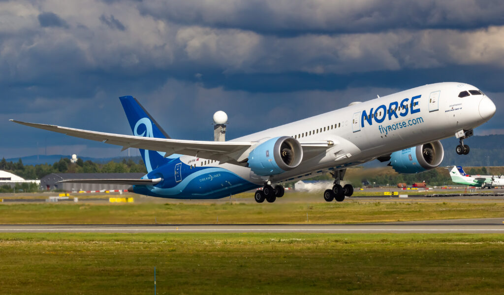 A Norse Atlantic Boeing 787 Dreamliner lifts off the runway.