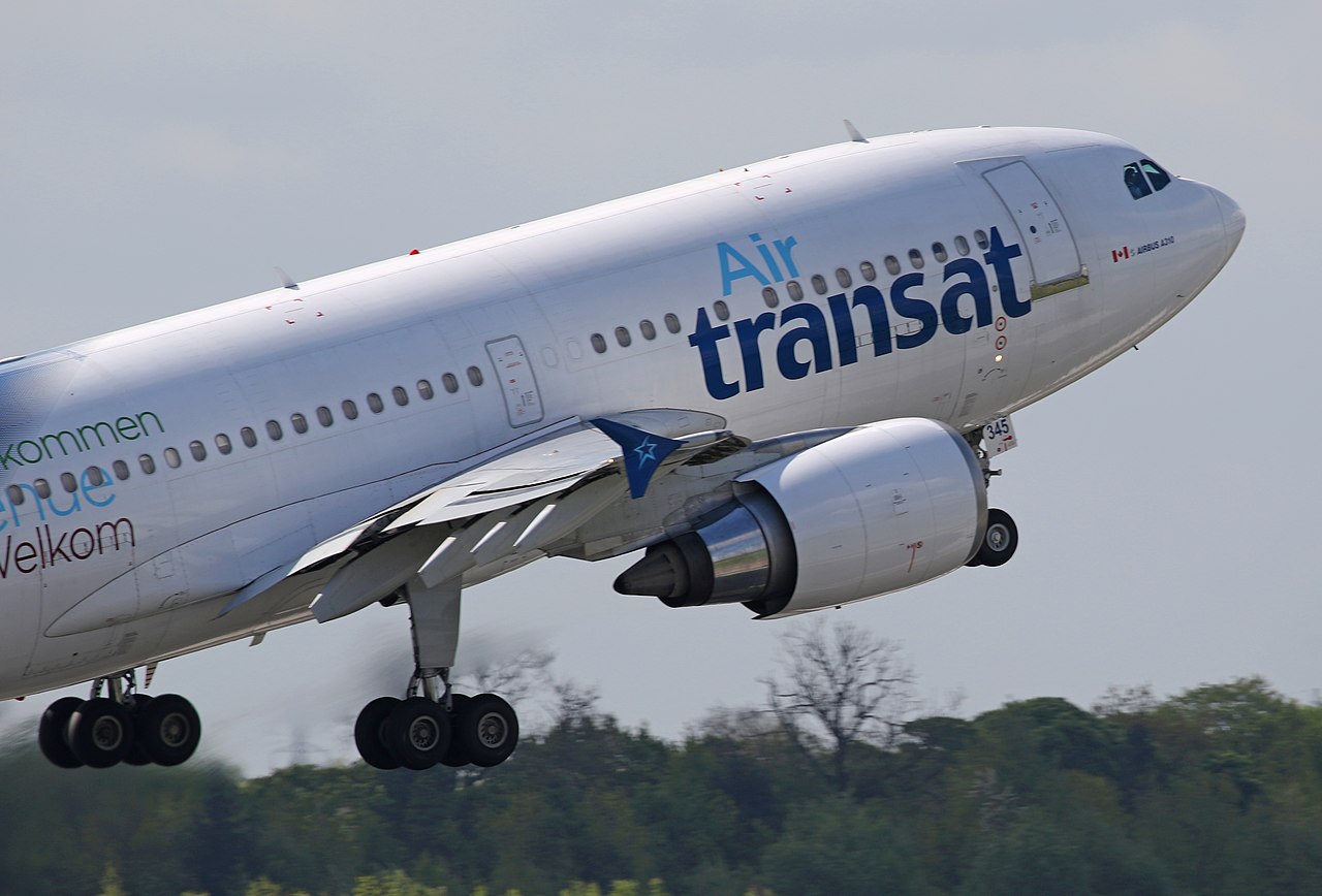 An Air Transat Airbus taking off at Manchester airport.