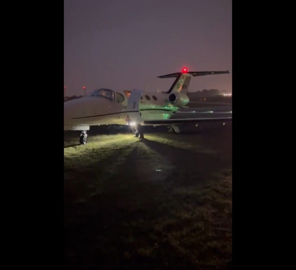 Afrojack Cessna Citation on the grass at Antwerp Airport
