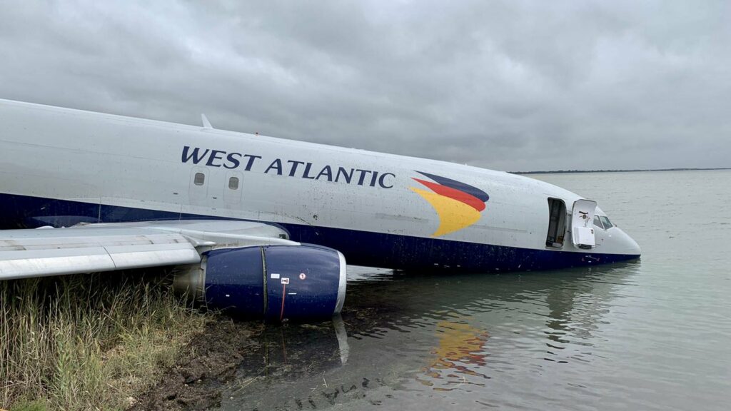 West Atlantic B737 freighter aircraft with nose submerged in lake after runway overrun at Montpellier Airport, France.