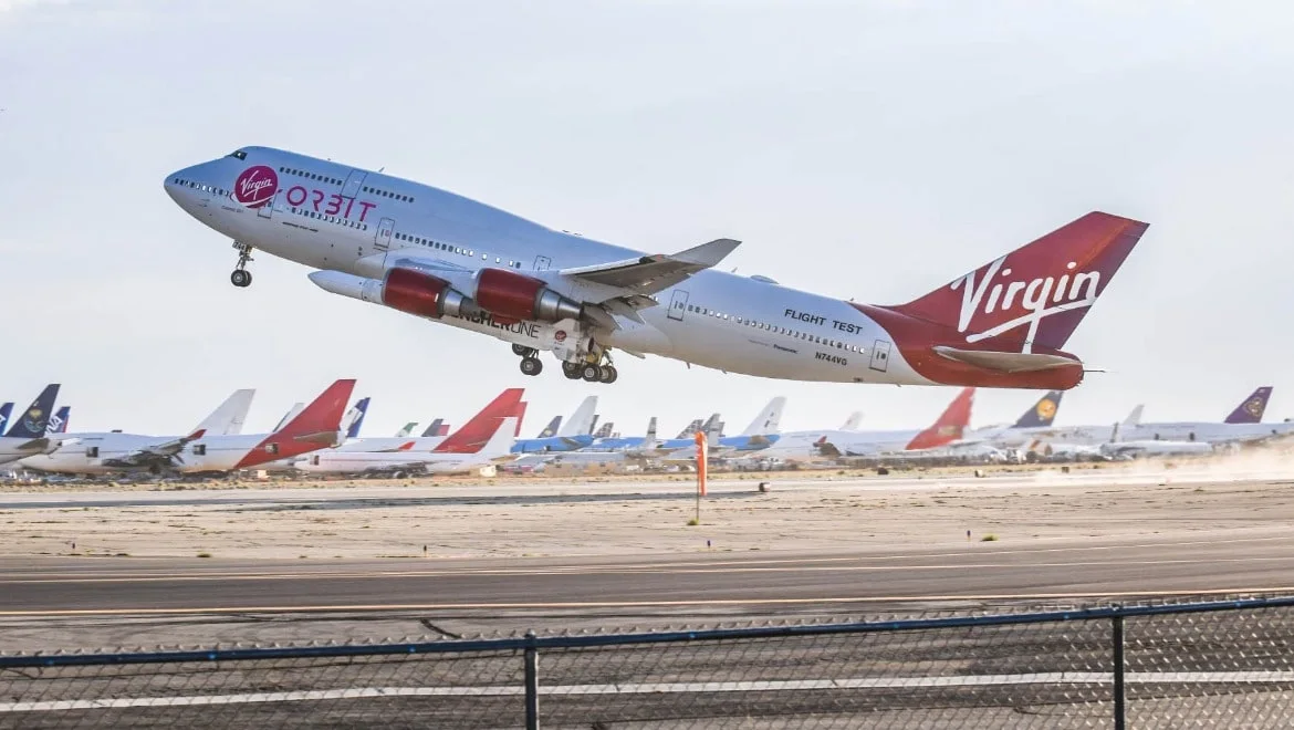 A Virgin Orbit Boeing 747 takes off in Mojave Desert carrying LauncherOne rocket.
