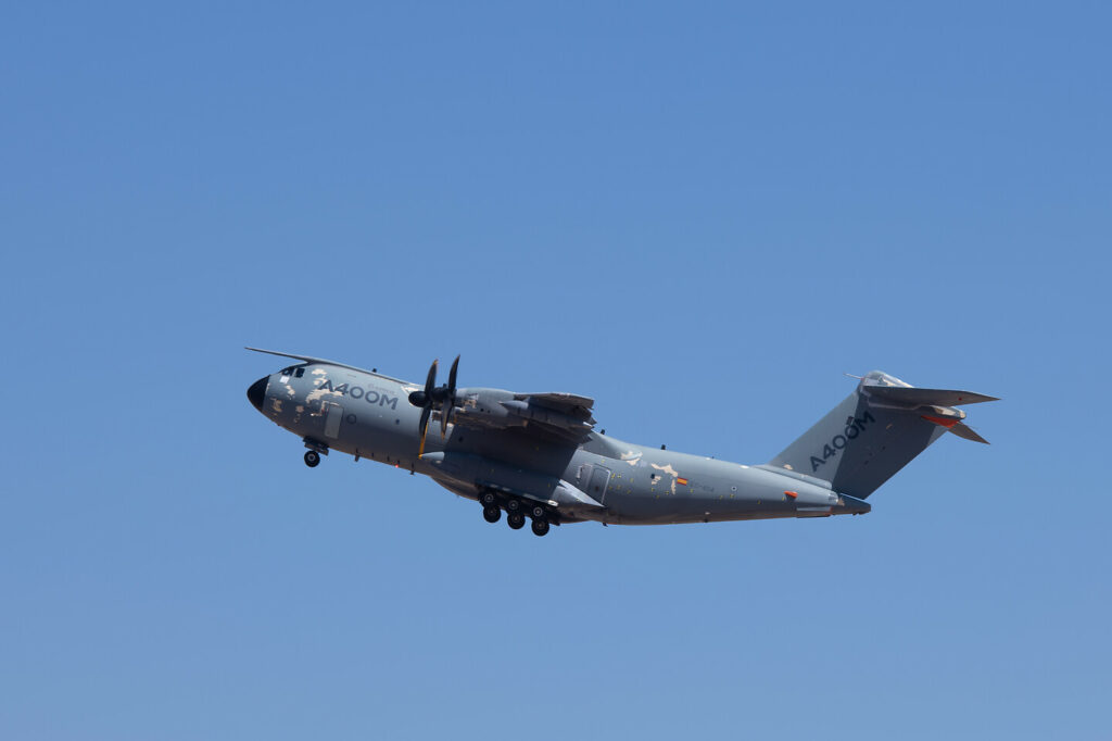 Airbus A400M MSN4 climbing after takeoff into a blue sky.