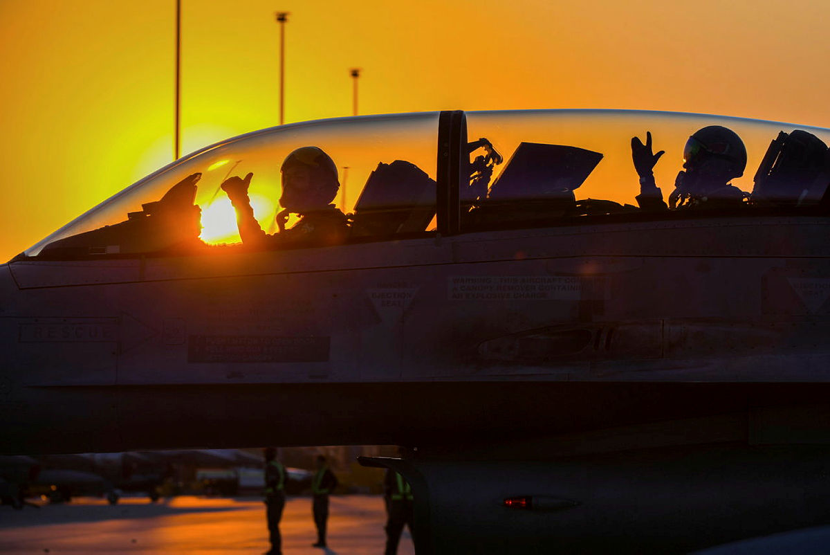 The setting sun glows against the canaopy of a fighter jet in Exercise Pitch Black 2022