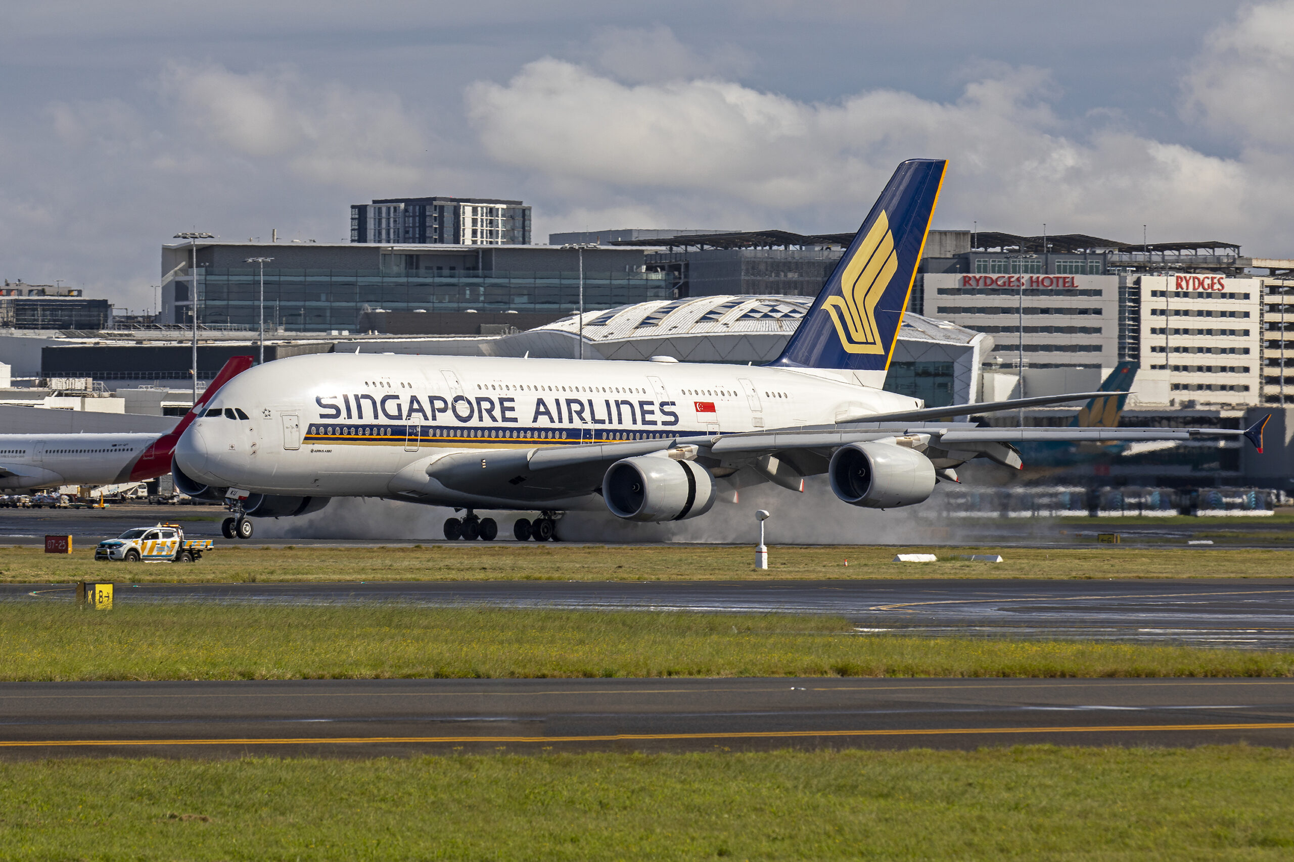 A Singapore Airlines Airbus A380 9V-SKU touches down.