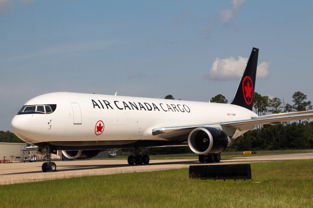 An Air Canada Cargo aircraft on the taxiway.