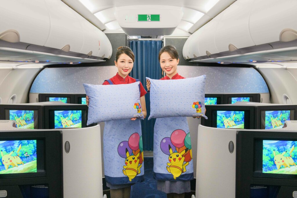 China Airlines cabin crew display the Pokémon themed pillows aboard the Pikachu aircraft. 