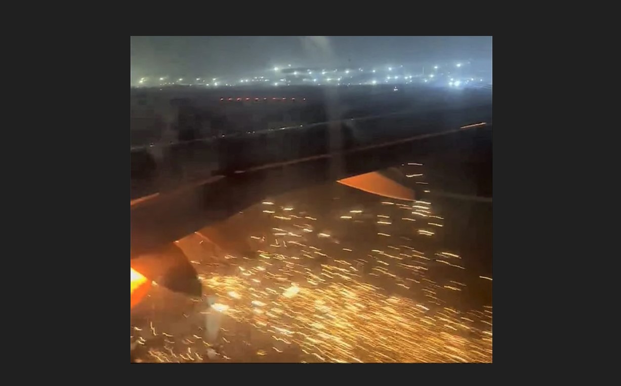 Sparks shoot from in IndiGo aircraft's engine during takeoff.