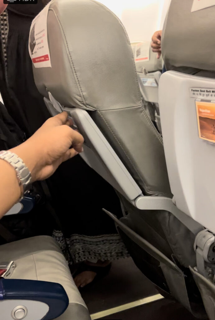 A faulty seat recliner on the SpiceJet 737.