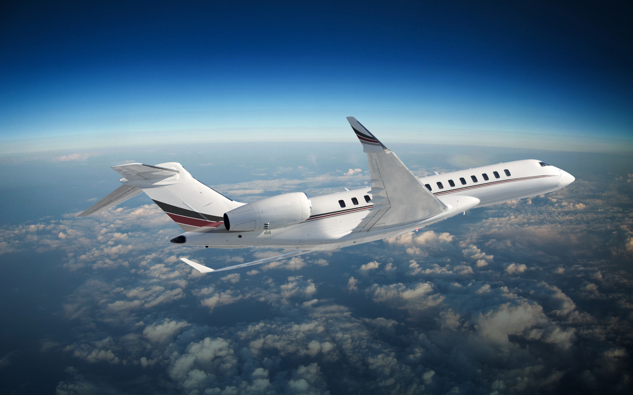 A Bombardier 8000 in flight for NetJets aircraft charter.