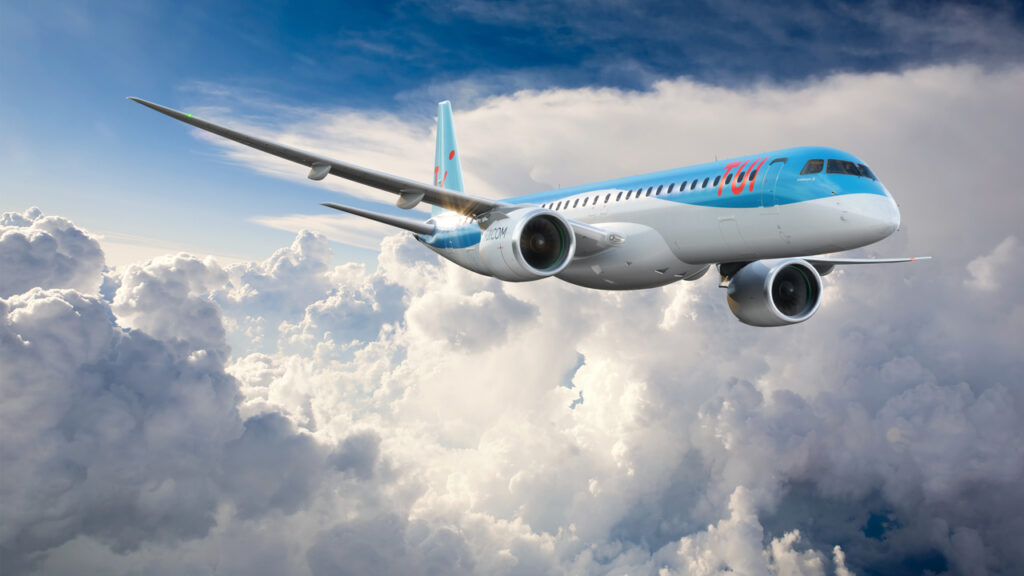 A render of the new TUI Embraer E195-E2 flying above cloud.