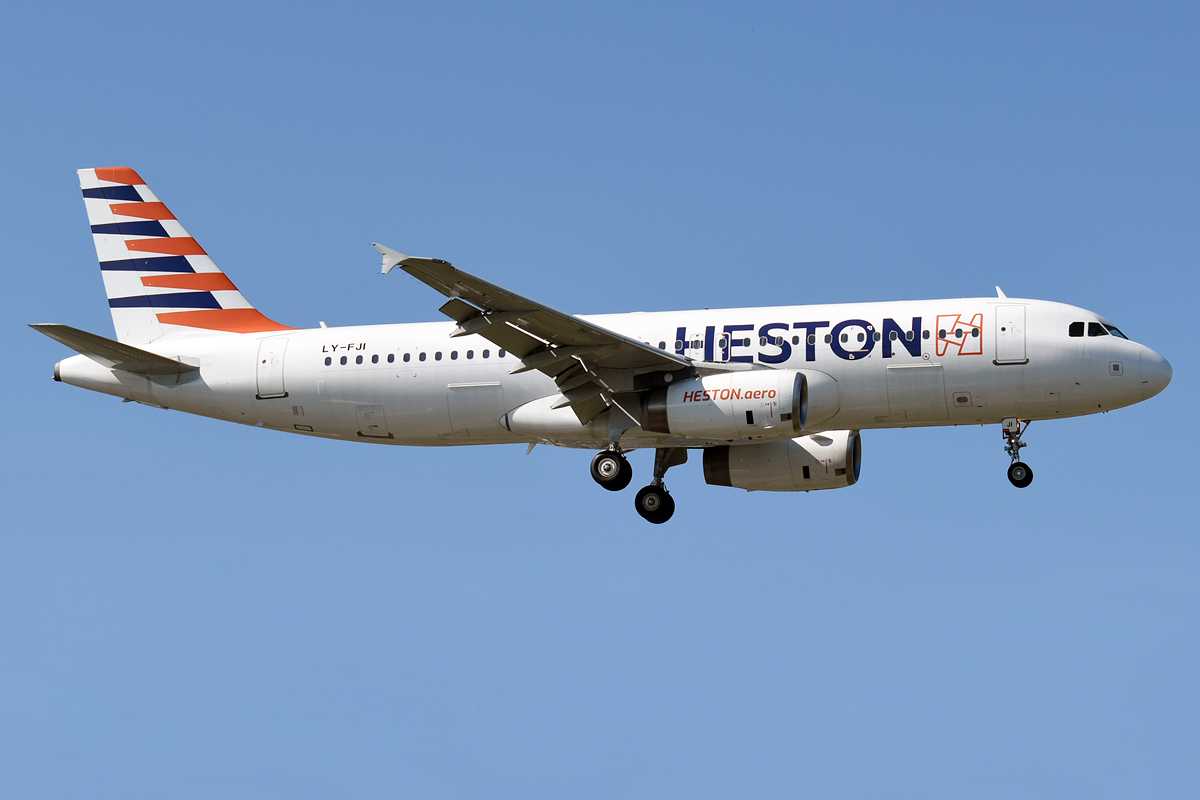 A Heston Airlines Airbus with landing gear down.
