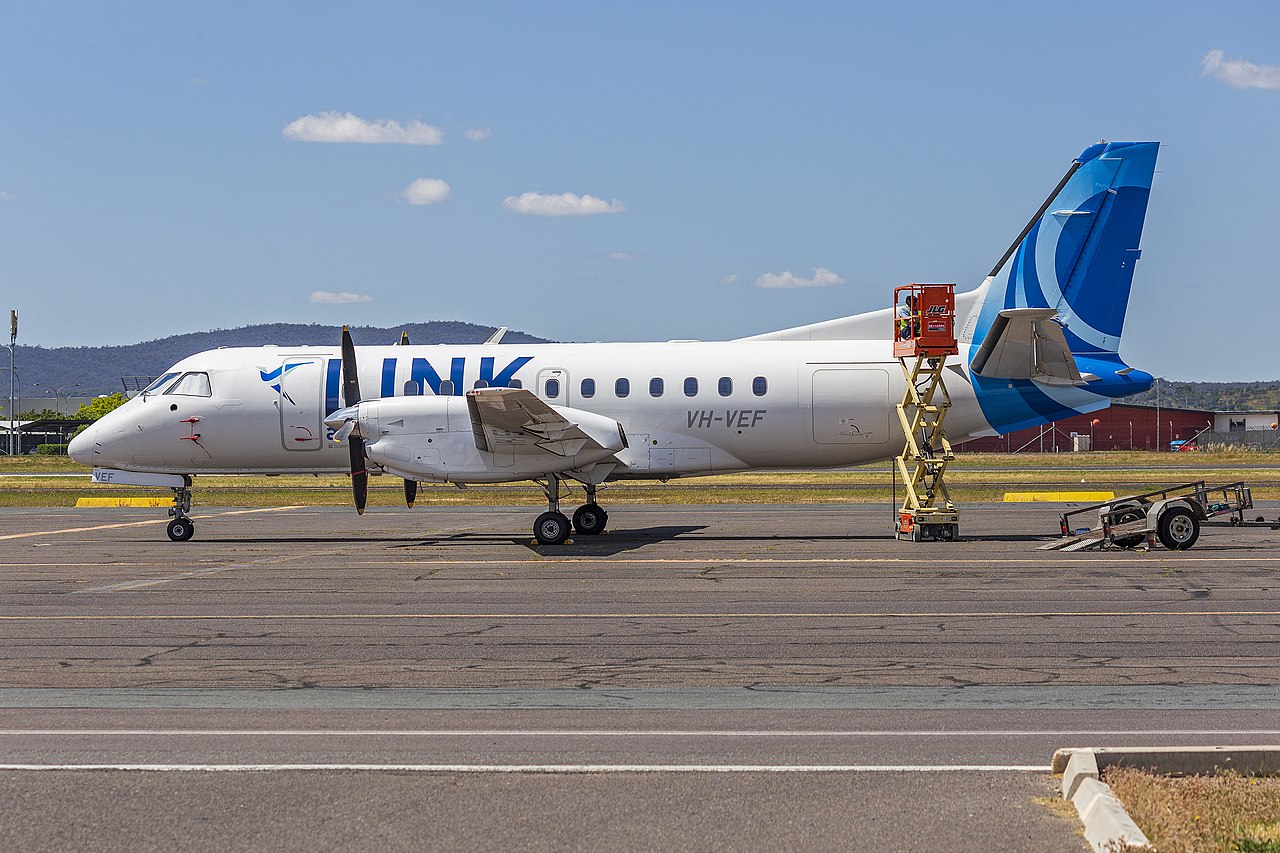 A Link Airways SAAB 340 aircraft parked on the tarmac.
