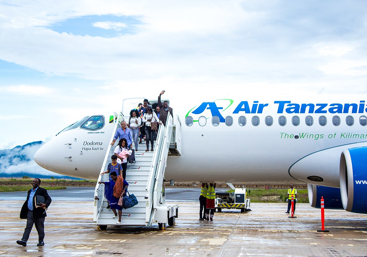 Passengeres disembark from an Air Tanzania Airbus A220