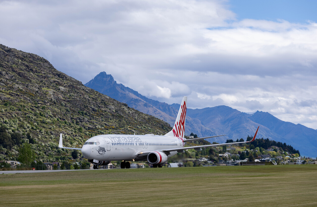 A Virgin Australia flight touches down in Queenstown New Zealand