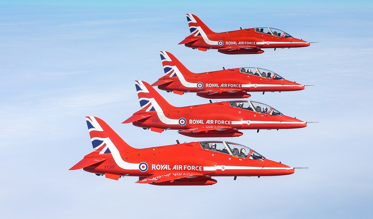Four Red Arrows aircraft in formation