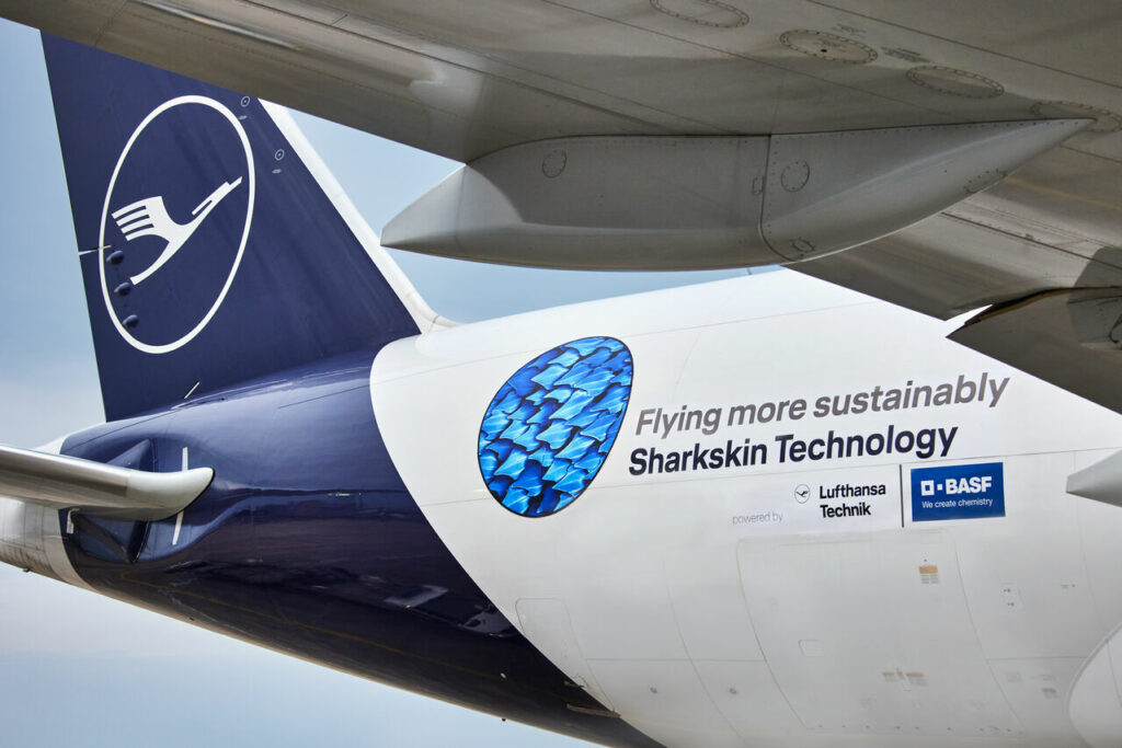 Lufthansa aircraft with AeroSHARK logo on the side.