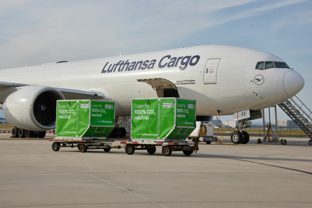 A Lufthansa Cargo freighter is loaded on the ramp.