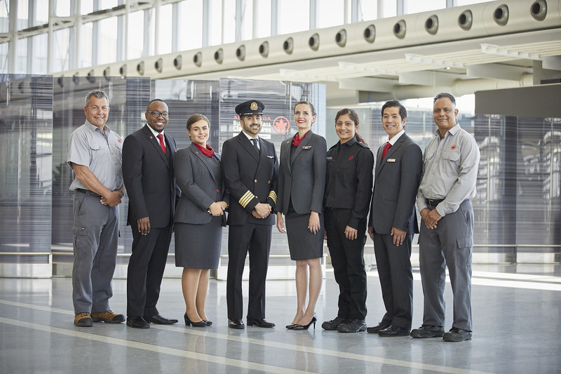 Air Canada staff pose after winning Global Traveler award.