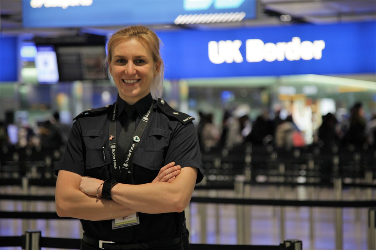 A Border Force officer stands in the Heathrow Airport terminal.