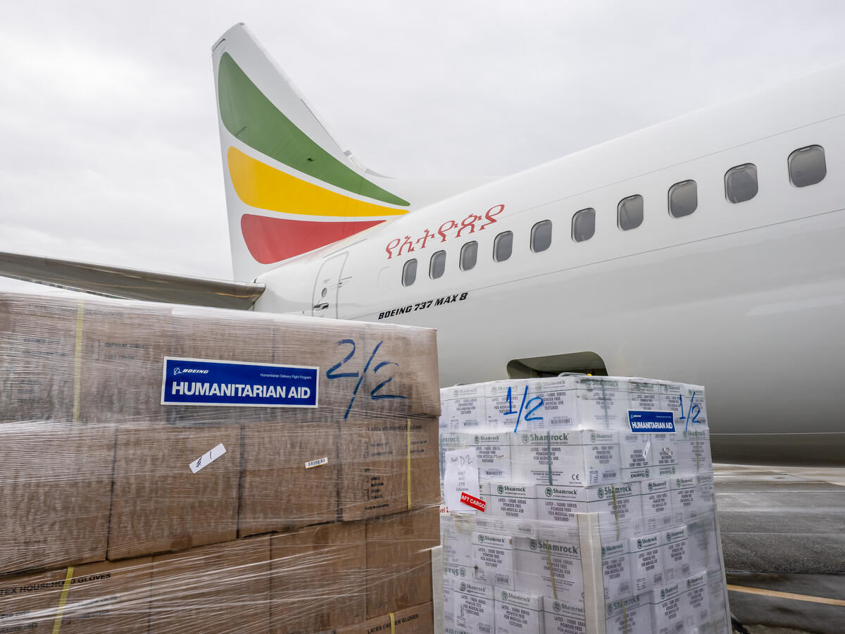 An Ethiopian Airlines Boeing MAX 8 aircraft with a pallet of emergency supplies.