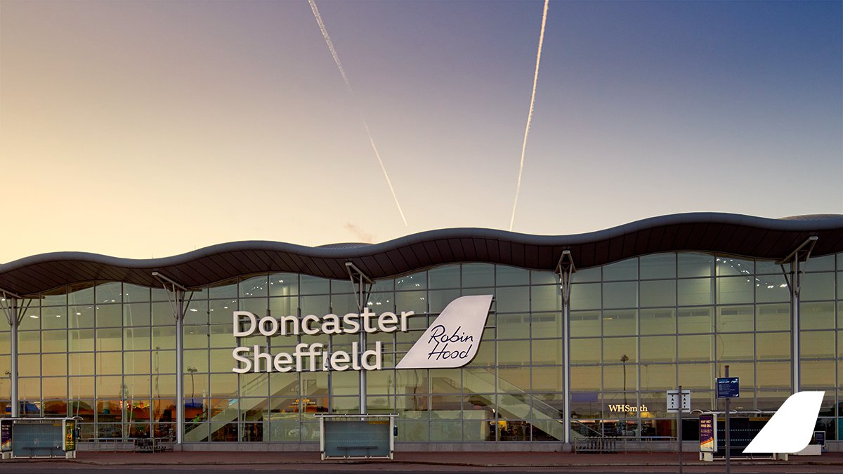 The Doncaster Sheffield Airport terminal at dusk.