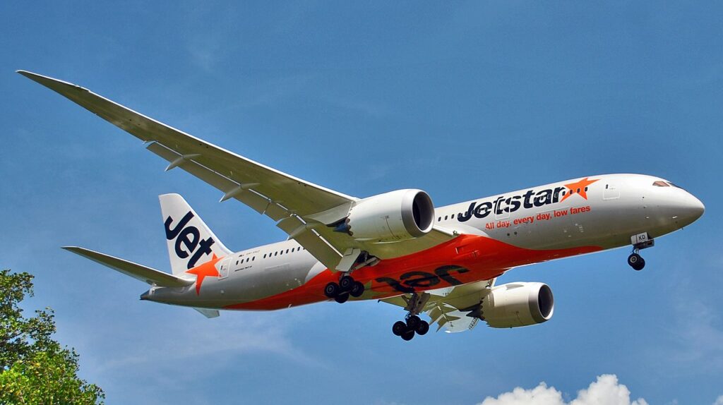 A Jetstar Dreamliner approaches Bali to land.