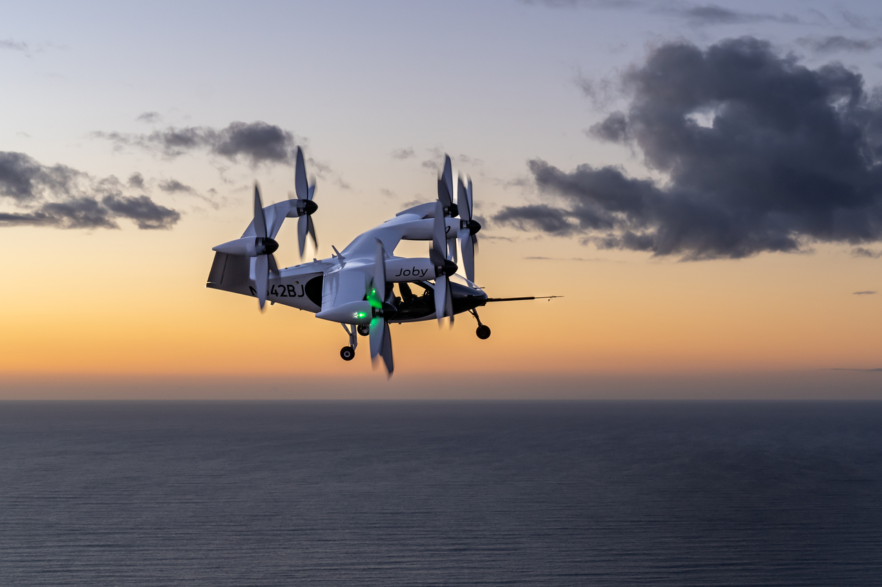 A Joby Aviation eVTOL all-electric aircraft in flight.