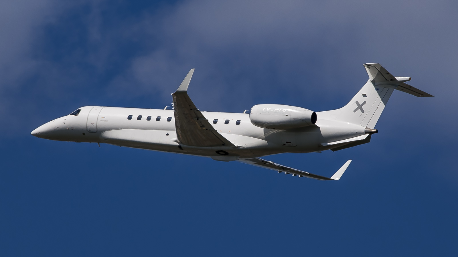 A Luxaviation business jet in flight.